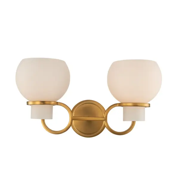 The Ascher is a traditional hurricane collection that has been updated for sophisticated 21st century interiors. Double ring details in the Winter Brass (WB) frame hold the frosted glass hurricanes. This collection follows the Kalco tradition of function and beauty in harmony. Collection: Ascher Rooms: Bed, Bath, Hall, Office Finish: Winter Brass Glass: White Opal Glass Width: 16.00" Height: 9.00" Length: 7.00" Weight: 4.00 lb Extension from Wall: 7.00" Wire: 7" Mounting Height: 7.00" Canopy: 5"x5" Number of Bulbs: 2 Maximum Wattage: 40.00 W Bulb Type: Candelabra Bulb Base: E12 Candelabra Dimmable Voltage: 120.00 V Material: Steel, Glass Country of Origin: China Safety Listing: cETL Safety Rating: Damp
