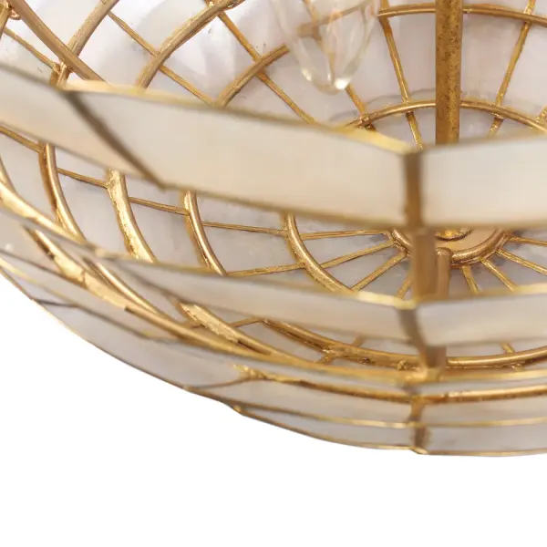 A contemporary Scandinavian artichoke silhouette gets a transitional makeover in this collection, where natural capiz shells are held in place by an Oxidized Gold Leaf finished frame. Collection: Samal Rooms: Hallway, Bedroom, Powder Room, Finish: Oxidized Gold Leaf Width: 16.00" Height: 13.00" Weight: 23.00 lb Wire: 12" Number of Bulbs: 3 Maximum Wattage: 40.00 W Bulb Type: E12 Bulb Base: E12 Candelabra Dimmable Voltage: 120.00 V Material: Capiz Shell, Steel Country of Origin: Philippines Safety Listing: UL-cUL Safety Rating: Dry - alternate view