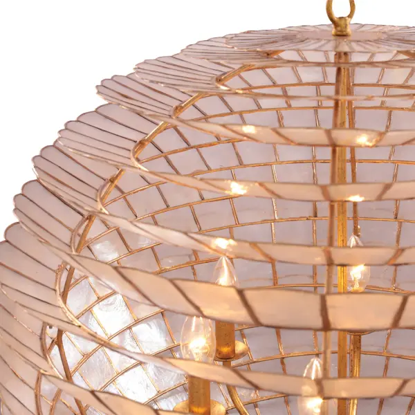 A contemporary Scandinavian artichoke silhouette gets a transitional makeover in this collection, where natural capiz shells are held in place by an Oxidized Gold Leaf finished frame. Collection: Samal Finish: Oxidized Gold Leaf Width: 25.00" Height: 28.00" Length: 25.00" Weight: 56.00 lb Chain: 48" Wire: 96" Canopy: 5"x1" Number of Bulbs: 6 Maximum Wattage: 40.00 W Bulb Type: E-12 Bulb Base: E12 Candelabra Dimmable Voltage: 120.00 V Material: Steel, Capiz Shell Country of Origin: Philippines Safety Listing: cETL Safety Rating: Dry - alternate view