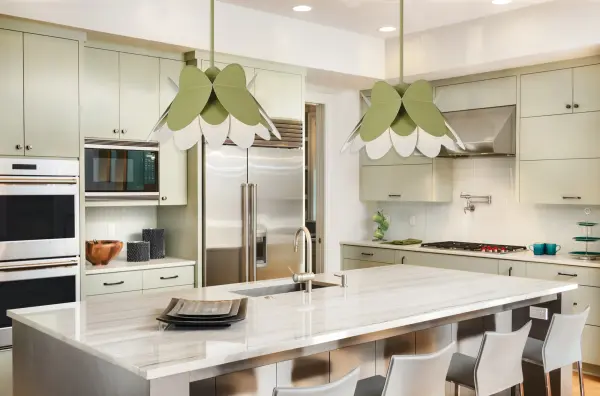 Soft scalloped edges form a fun flower shape in a single color story from petal to canopy, paired with a white interior for a soft, comfortable glow. Includes 90 degree swivel. Collection: Flor Rooms: Kitchen, Dining Room, Restaurant, Finish: White and Green Width: 26.00" Height: 21.00" Weight: 15.00 lb Wire: 96" Rod: (1) 6", (1) 12", (1) 24" Canopy: 5"x1" Number of Bulbs: 1 Maximum Wattage: 60.00 W Bulb Type: E26 Bulb Base: E26 Medium Dimmable Voltage: 120.00 V Material: Steel Country of Origin: China Safety Listing: UL-cUL Safety Rating: Dry - alternate view