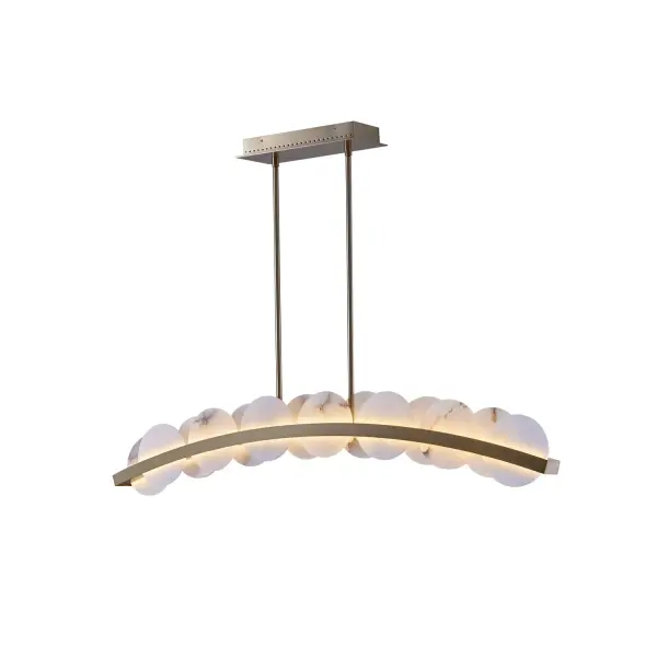 Inspired by the soft glow of the moon, Meridian brings the beauty of the mineral stone indoors. This gently curved slim silhouette frame is accented with authentic Alabaster discs that diffuse the light. Features LED technology and a warm Winter Brass finish. Collection: Meridian Rooms: Kitchen Finish: Winter Brass Width: 2.25" Height: 9.00" Length: 47.50" Weight: 26.40 lb Wire: 156" Rod: (2) 6", (2) 12", (2) 24" Canopy: 5.5"x1.5"x13" Bulbs Included Maximum Wattage: 61.00 W Bulb Type: LED Light Source: LED Light Output: 3300.00 lm Color Temperature: 3000 K CRI: 90 Dimmable Voltage: 120.00 V Material: Alabaster, Stainless Steel Country of Origin: China Safety Listing: UL-cUL Safety Rating: Dry LED