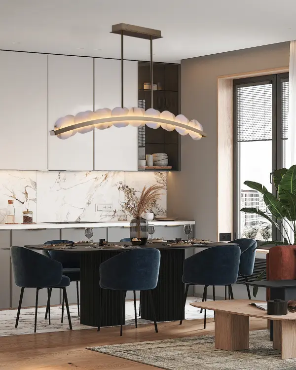 Inspired by the soft glow of the moon, Meridian brings the beauty of the mineral stone indoors. This gently curved slim silhouette frame is accented with authentic Alabaster discs that diffuse the light. Features LED technology and a warm Winter Brass finish. Collection: Meridian Rooms: Kitchen Finish: Winter Brass Width: 2.25" Height: 9.00" Length: 47.50" Weight: 26.40 lb Wire: 156" Rod: (2) 6", (2) 12", (2) 24" Canopy: 5.5"x1.5"x13" Bulbs Included Maximum Wattage: 61.00 W Bulb Type: LED Light Source: LED Light Output: 3300.00 lm Color Temperature: 3000 K CRI: 90 Dimmable Voltage: 120.00 V Material: Alabaster, Stainless Steel Country of Origin: China Safety Listing: UL-cUL Safety Rating: Dry LED - alternate view