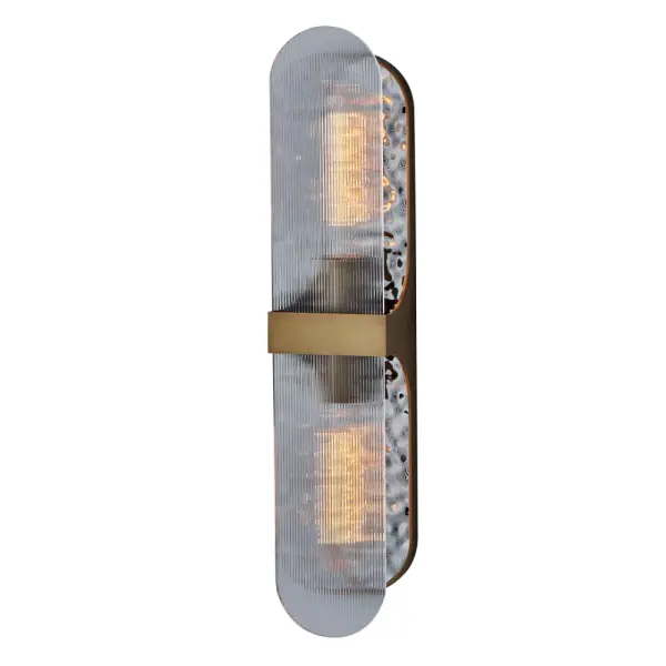 Inspired by the beauty of the sun reflecting on the ocean, Mirage adds serene elegance to any space. A textured mirror-like reflector behind clear reeded glass creates a gentle glow that provides a dazzling light pattern brought together with our True Brass finish. Collection: Mirage Rooms: Bathroom, Powder Room, Hallway, Theater Finish: True Brass Width: 4.50" Height: 22.00" Weight: 5.00 lb Extension from Wall: 3.75" Wire: 12" Canopy: 4.5" Maximum Wattage: 40.00 W Bulb Type: E26 Bulb Base: E26 Medium Dimmable Voltage: 120.00 V Material: Steel, Glass Country of Origin: China Safety Listing: UL-cUL Safety Rating: Dry
