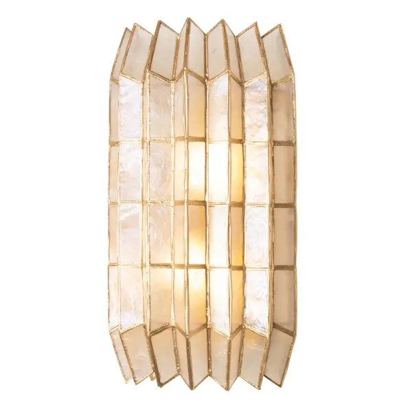 Drawing inspiration from origami, geometric designs, and the natural elegance of crystal cuts, the Fractal collection showcases a captivating zig-zag frame pattern mirrored in the capiz shade's form. It emanates a gentle, warm glow that beautifully highlights its intricate design and understated shape. The piece is completed with a hand-applied Oxidized Gold Leaf (OL) finish, adding a touch of refined artistry. Collection: Fractal Finish: Oxidized Gold Leaf Width: 5.50" Height: 8.50" Length: 5.50" Extension from Wall: 15.00" Wire: 8" Rod: 8" Canopy: 5"x5"x3" Number of Bulbs: 2 Maximum Wattage: 40.00 W Bulb Base: E12 Candelabra Dimmable Voltage: 120.00 V Material: Steel, Capiz Country of Origin: Philippines Safety Rating: Dry Instructions - alternate view