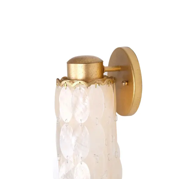 Inspired by waterfalls, the Edgy Collection features an elegant, wavy design with overlapping Capiz shell that creates a soft glow from the LED downlight complementing the beautiful Oxidized Gold Leaf finish. Collection: Edgy Rooms: Powder Room, Bedroom, Living Room, Dining Room Finish: Oxidized Gold Leaf Width: 5.00" Height: 20.25" Weight: 8.00 lb Extension from Wall: 5.00" Wire: 12" Canopy: 5"x0.5" Bulbs Included Number of Bulbs: 1 Maximum Wattage: 4.00 W Bulb Type: G9 Bulb Base: G9 Light Source: LED Dimmable Voltage: 120.00 V Material: Steel, Capiz Country of Origin: Philippines Safety Listing: UL-cUL Safety Rating: Dry LED - alternate view