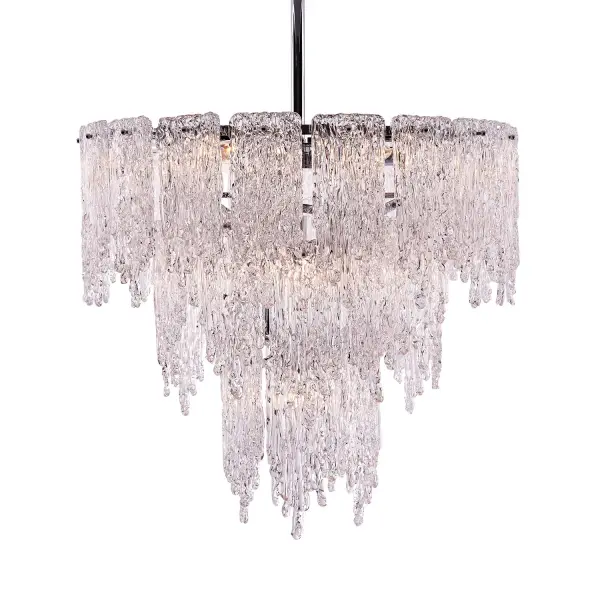 Gisel embraces the unconventional charm of uneven textures that add a touch of uniqueness to any space. Each piece is meticulously crafted to bring nature's marvels, such as icy rivers and their bewitching flows, right to your fingertips. You'll feel a sense of ae as light dances through the layers, casting a spellbinding reflection that captures attention and imagination. This collection is offered in a Polished Chrome finish. Collection: Gisel Finish: Polished Chrome Width: 24.00" Height: 28.00" Weight: 42.00 lb Wire: 96" Rod: (1) 6", (1) 12", (1) 24" Canopy: 5"x2" Number of Bulbs: 10 Maximum Wattage: 40.00 W Bulb Type: Candelabra Bulb Base: E12 Candelabra Dimmable Voltage: 120.00 V Material: Steel and Glass Country of Origin: China Safety Listing: cETL Safety Rating: Dry