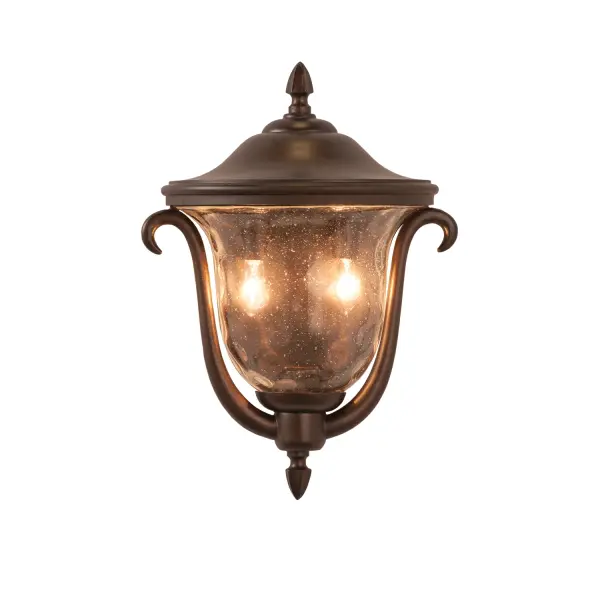 The Santa Barbara Collection was inspired by Colonial Mexico's Mission Churches and Cathedrals. The long history of hand-crafted wrought iron, shared by both Mexico and Kalco, come together to create a series of outdoor lighting pieces that feature Kalco's exclusive Burnished Bronze, Textured Matte Black finishes and Clear Seeded Hammered Glass shades. Collection: Santa Barbara Outdoor Rooms: Living Room, Bedroom, Family Room, Dining Room Finish: Burnished Bronze Glass: Clear Hammered Width: 13.00" Height: 18.00" Weight: 5.00 lb Extension from Wall: 7.00" Wire: 6" Mounting Height: 7.00" Canopy: 7"x11.5" Number of Bulbs: 2 Maximum Wattage: 40.00 W Bulb Type: E12 Bulb Base: E12 Candelabra Dimmable Voltage: 120.00 V Material: Aluminum Country of Origin: China Safety Listing: cETL Safety Rating: Wet
