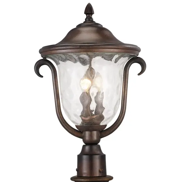 The Santa Barbara Collection was inspired by Colonial Mexico's Mission Churches and Cathedrals. The long history of hand-crafted wrought iron, shared by both Mexico and Kalco, come together to create a series of outdoor lighting pieces that feature Kalco's exclusive Burnished Bronze, Textured Matte Black finishes and Clear Seeded Hammered Glass shades. Collection: Santa Barbara Outdoor Rooms: Foyer, Kitchen, Dining Room, Den Finish: Burnished Bronze Notes: Medium Post Mount Lantern Width: 13.00" Height: 19.00" Weight: 5.00 lb Wire: 72" Number of Bulbs: 3 Maximum Wattage: 60.00 W Bulb Type: Candelabra Bulb Base: E12 Candelabra Dimmable Voltage: 120.00 V Material: Aluminum Country of Origin: China Safety Listing: cETL Safety Rating: Wet