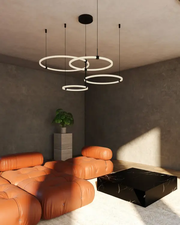 The Bruni 55-inch chandelier combines modern geometric design with practical functionality. Its adjustable circular rings offer customizable styling, while integrated LED technology provides ample warm lighting for large spaces. - alternate view