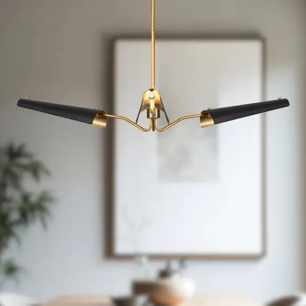 The Osorio 46-inch chandelier masterfully blends mid-century modern aesthetics with Scandinavian design principles. Its luxurious matte black and vintage brass finish creates a sophisticated mixed-metal look that transcends design styles. - alternate view