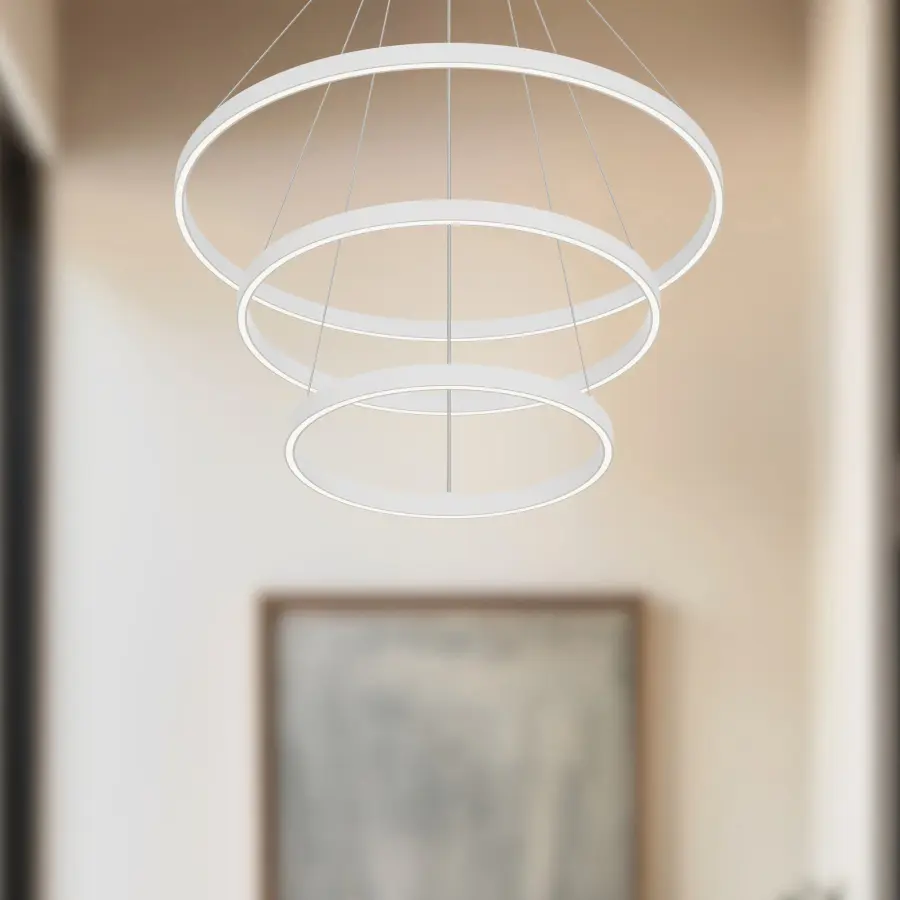 Striking Three-Tier Modern Chandelier with Warm Ambient Lighting - Image 3