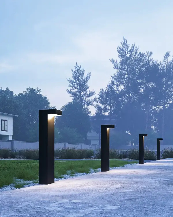 The Evans 24-inch bollard delivers sophisticated outdoor illumination with integrated LED technology and a timeless matte black finish. Perfect for walkways and paths, it combines modern aesthetics with practical functionality. - alternate view
