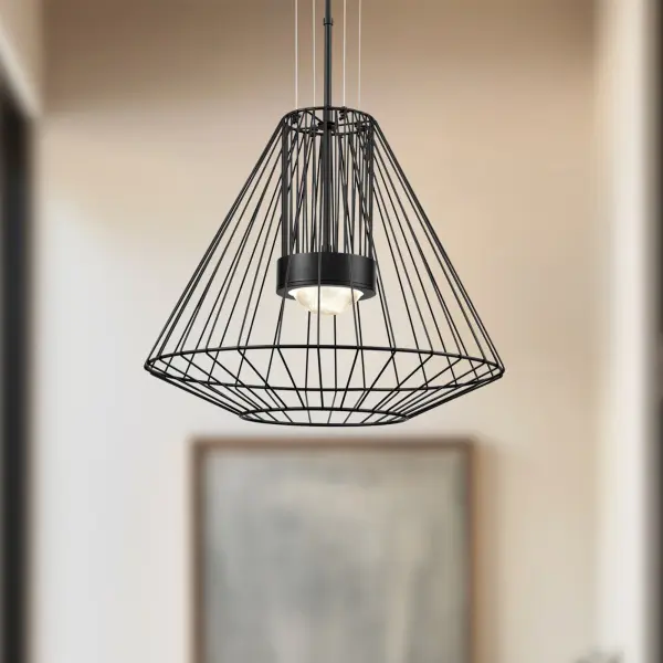 The Arctic pendant combines industrial wire framework with a substantial glass optic, creating dramatic visual interest. Its integrated LED and weather-resistant construction make it versatile for both interior and exterior applications. - alternate view