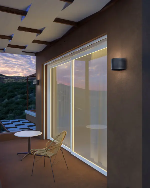 The Rene wall sconce delivers clean, contemporary styling with its angular cast-aluminum body in matte black. Integrated LED technology provides warm 3000K lighting, while dimmable functionality and up/down mounting options offer flexibility. - alternate view