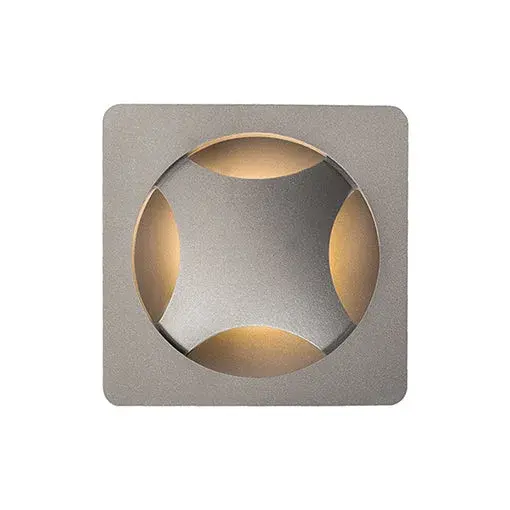 The Etna wall sconce features a distinctive curved design that creates ambient lighting while adding contemporary architectural interest. Integrated LED technology provides energy-efficient illumination in a durable powder-coated finish suitable for any environment. - alternate view