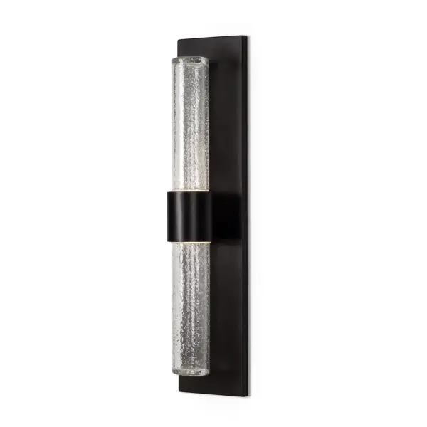 The Copenhagen wall sconce combines minimalist geometry with detailed translucent glass for elegant outdoor illumination. Its integrated LED and weather-resistant design make it ideal for modern exteriors.