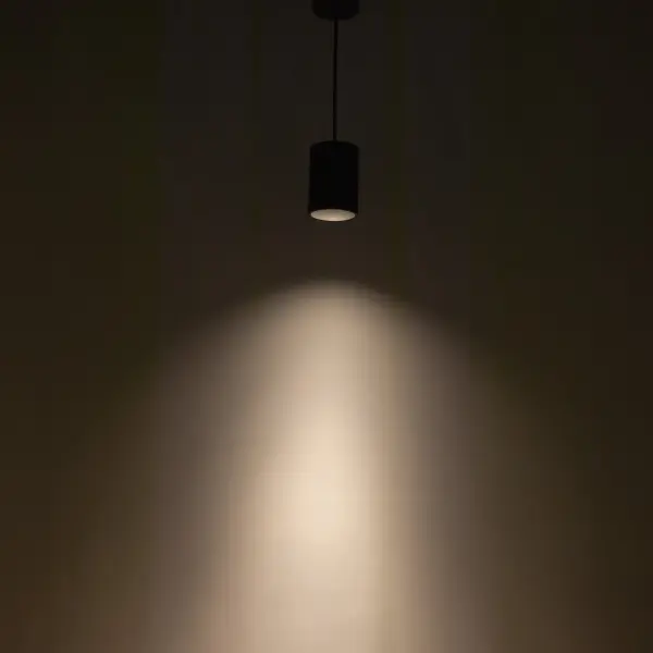 The Lorna 6-inch cylinder pendant combines minimalist design with architectural-grade performance. Its clean white finish and compact 4-inch diameter make it ideal for modern spaces requiring focused downlighting. - alternate view
