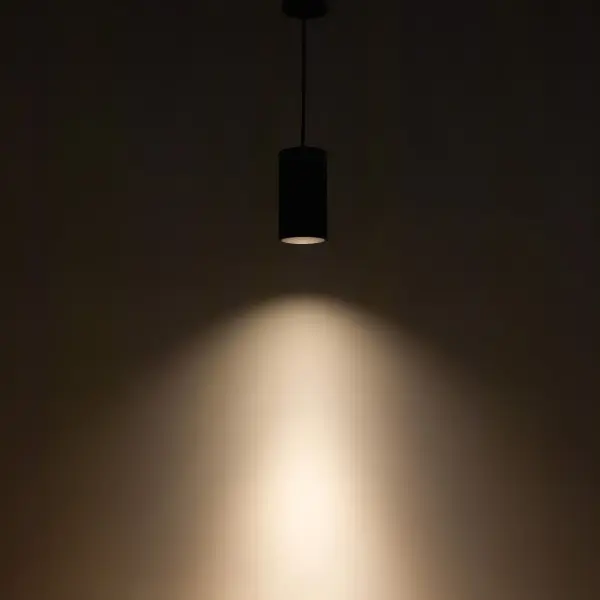 The Lorna 8-inch cylinder pendant combines minimalist design with architectural-grade performance. Its clean white finish and compact 4-inch diameter make it ideal for modern spaces requiring focused downlighting. - alternate view