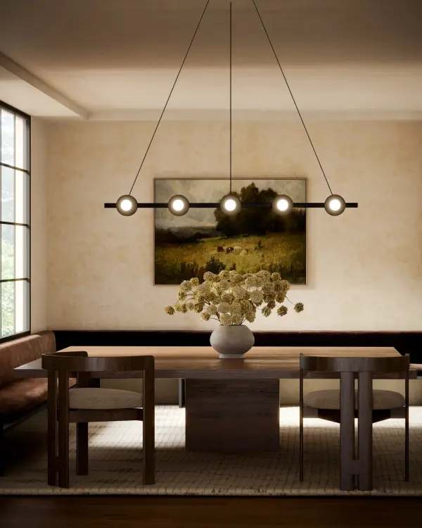 The Elixir 48-inch linear pendant masterfully combines opal glass globes with bold modern disks in a clean, striking form. Its integrated LED technology and versatile contemporary aesthetic make it perfect for dining rooms and kitchen islands. - alternate view