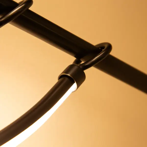 Aryas 60-Inch Linear Pendant in Vintage Brass - Image 13