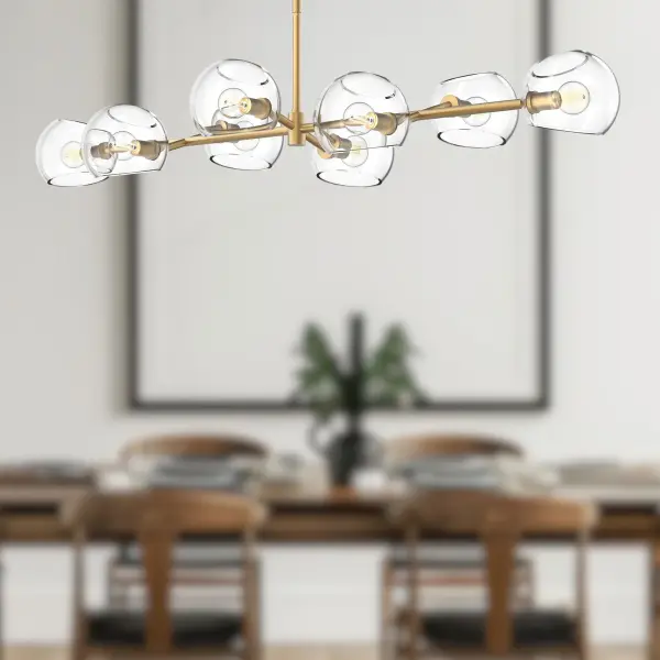 The Willow Linear Pendant combines art and function with its 48-inch span, brushed gold finish, and distinctive copper glass shades. Mix-and-match options allow personalization while the linear design provides excellent task lighting. - alternate view