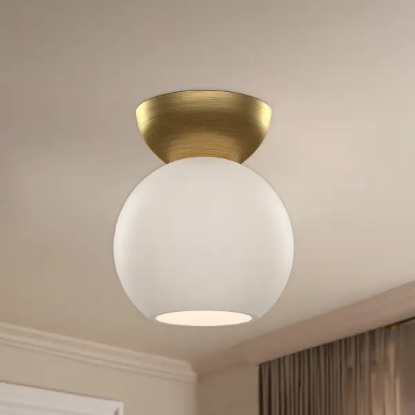 The Arcadia semi-flush mount delivers clean, contemporary style with its elegant sphere shade in soft opal glass. Perfect for spaces with lower ceilings, this 6-inch fixture provides ambient lighting without visual clutter. - alternate view