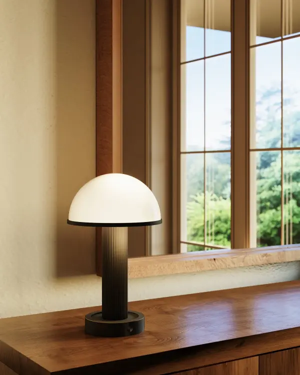 Vienna combines timeless architectural elegance with modern portability. Its ribbed metal stem and opal glass diffuser create a warm, sculptural glow perfect for any room. Rechargeable with 6-hour battery life. - alternate view