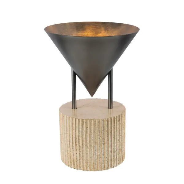 The Versus table lamp transforms lighting into sculptural art with its surrealist-inspired design. Featuring a metal cone shade in luxe Patina Bronze atop a faux soapstone column base, this Jason Koharik creation brings architectural elegance and dramatic visual intrigue to any space.