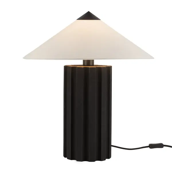 The Ono table lamp brings Japandi design philosophy to life with its triangular fabric shade and distinctive lava rock-textured base. This 20-inch piece balances natural aesthetics with modern minimalism, creating a functional art piece.