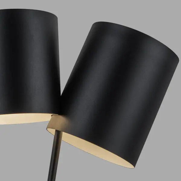 The Keiko table lamp brings vintage Mid-Century inspiration to modern spaces with its distinctive dual asymmetrical shade design. The brushed gold finish adds warmth and sophistication to any room. - alternate view