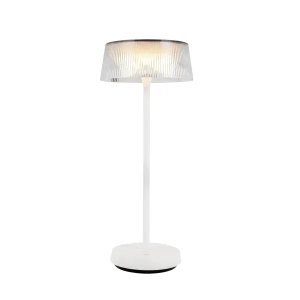 The Tindra combines timeless elegance with modern convenience through its ribbed acrylic shade that mimics classic crystal. Featuring integrated LED with dimming capability and rechargeable battery, it delivers portable sophistication.