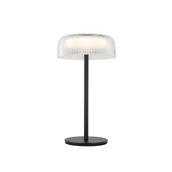The Brilla combines sophisticated ribbed acrylic styling with modern convenience. Its rechargeable battery and integrated LED make it perfect for flexible placement anywhere in your home without cord constraints.