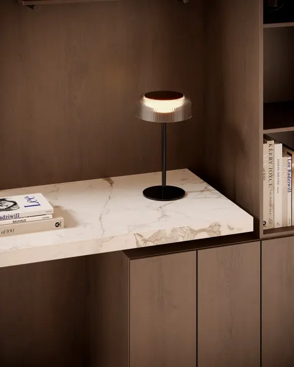 The Brilla combines sophisticated ribbed acrylic styling with modern convenience. Its rechargeable battery and integrated LED make it perfect for flexible placement anywhere in your home without cord constraints. - alternate view