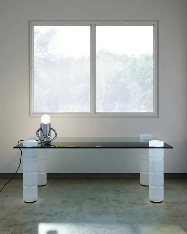 The Septum table lamp transforms functional lighting into art with its jewelry-inspired pierced metal hardware. Created in collaboration with designer Hannah Jewett, this 8-inch lamp features integrated LED technology and a sleek contemporary silhouette that works beautifully in modern interiors. - alternate view