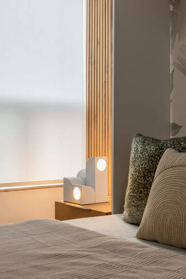 The Gypsum table lamp by designer Sean Brown brings architectural elegance to any space with its distinctive curved archways and rounded acrylic diffusers. The integrated LED provides warm 2700K lighting through a polished brass finish that adds luxe appeal. - alternate view