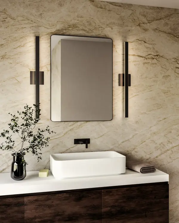 The Vera vanity light combines modern aesthetics with practical functionality, featuring integrated LED technology and a slim rectangular frame in brushed gold. Its dual-sided illumination and versatile mounting options make it ideal for contemporary bathrooms and hallways. - alternate view