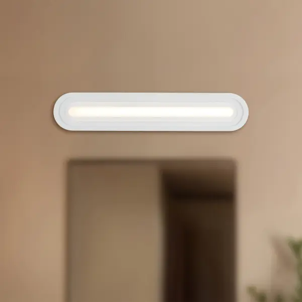 Modern Pill-Shaped Vanity Light with Integrated LED Technology - Image 3
