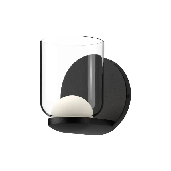 The Cedar Wall Sconce combines contemporary design with practical versatility. Its frosted glass diffuser inside clear glass creates a soft, warm glow perfect for bathrooms and hallways. The integrated LED and multiple mounting options make it adaptable to various spaces.