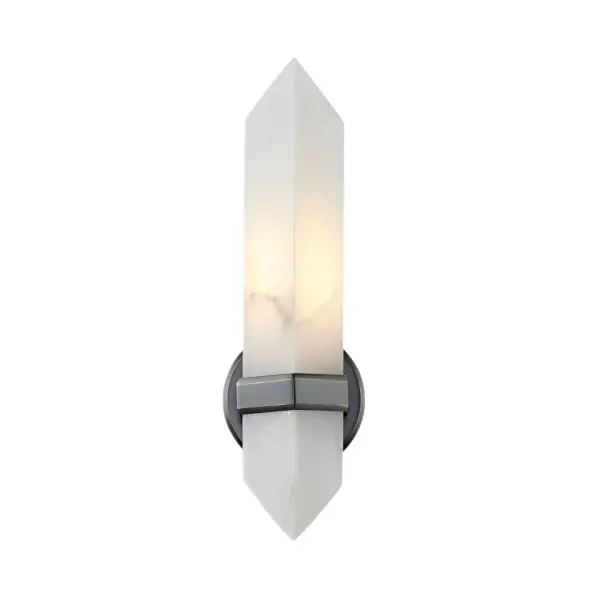 The Valencia vanity light showcases stunning natural alabaster stone in a diamond-shaped shade with polished nickel accents. Each piece features unique veining and tone variations, creating sculptural art that provides breathtaking ambiance in bathrooms and beyond.
