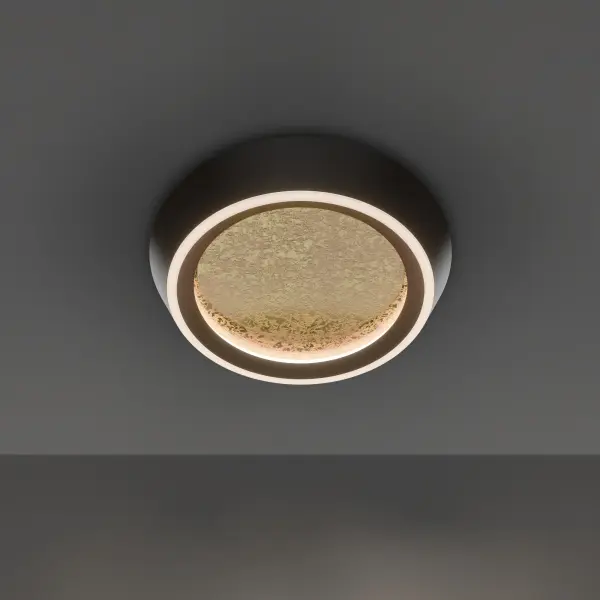 The Tinzel flush mount combines modern LED efficiency with luxurious design. Its textured gold leaf interior reflects light beautifully, while the slim 3-inch profile fits low ceilings perfectly. Selectable color temperature adds versatility.