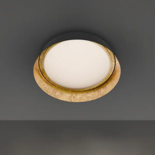 The Gilt flush mount combines opulent gold leaf finish with modern LED technology, delivering 2544 lumens of warm 3000K light. Its hand-finished dark bronze exterior with lustrous gold interior creates sophisticated ambiance.