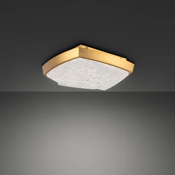 The Kenji Flush Mount combines minimalist geometry with artisanal reclaimed crystal for a sophisticated lighting solution. Its compact 11" profile delivers powerful 1670-lumen illumination while the crystal diffuser creates a radiant, softened glow. Perfect for spaces requiring both style and function.