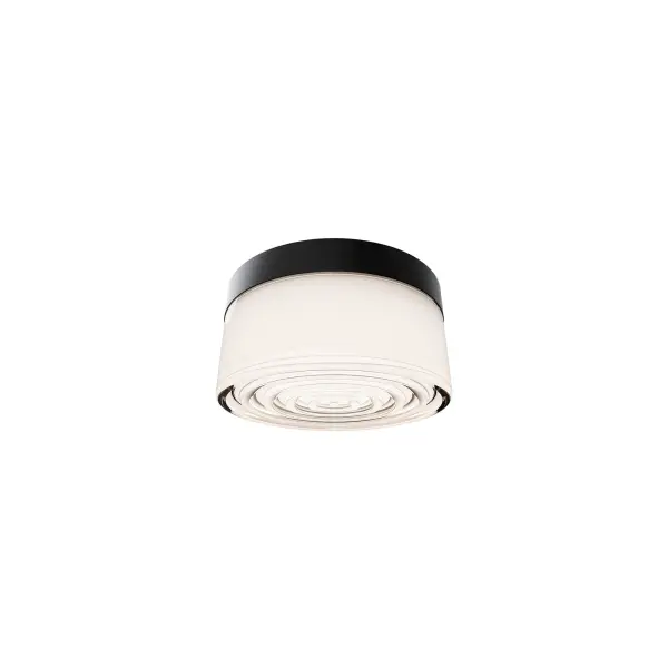 The Tuck Outdoor Flush Mount combines minimalist design with exceptional durability. Its wet-rated construction and heat-resistant sauna option make it versatile for patios, porches, and wellness spaces. Compact at 5.4", it delivers 1125 lumens of soft, even light with selectable color temperatures. - alternate view