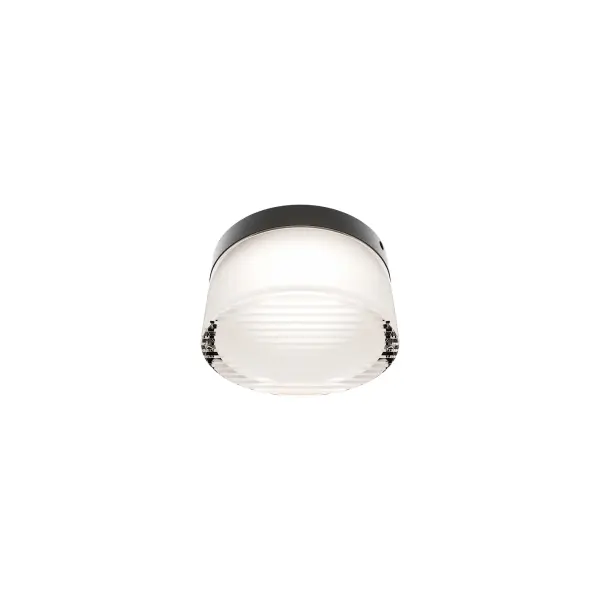 The Tuck III delivers minimalist design with maximum functionality. Its compact 5" profile, ribbed diffuser, and 4CCT selectable color temperature make it ideal for patios, porches, and wellness spaces. Wet-rated and durable. - alternate view