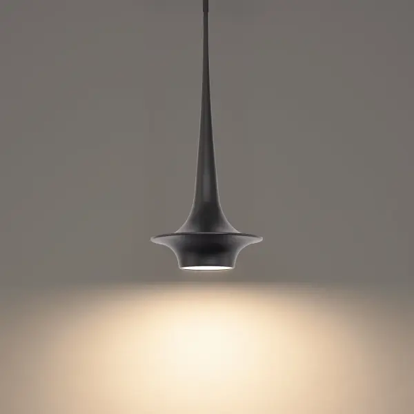 The Hugo Mini Pendant combines sculptural elegance with high-performance LED technology. Its elongated trumpet silhouette and etched glass diffuser create sophisticated ambient lighting perfect for intimate spaces.