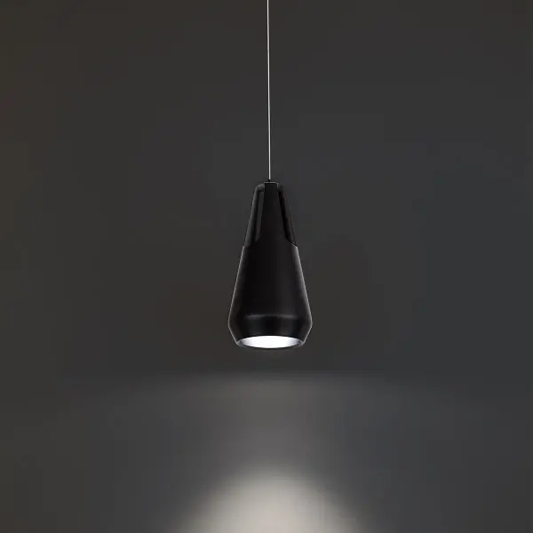 The Ingot Mini Pendant delivers sophisticated mid-century styling in a compact 10" form. Its unique capsule design with internal illumination creates visual interest while the adjustable aircraft cable offers installation flexibility.