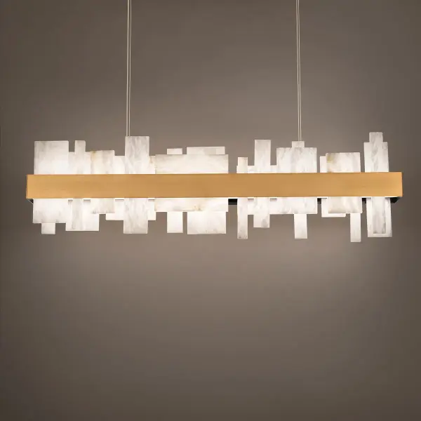 The Acropolis Linear Pendant combines architectural sophistication with natural beauty. Spanish alabaster forms create a luminous focal point, while ultra-thin cables and minimal hardware maintain clean lines. High CRI and generous lumens deliver exceptional illumination.