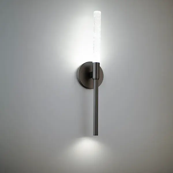 The Magic Wall Light combines modern minimalism with artistic flair through its crystallized art glass and dual-end LED illumination. Its slim 3-inch profile and 20-inch vertical design create a sophisticated statement.