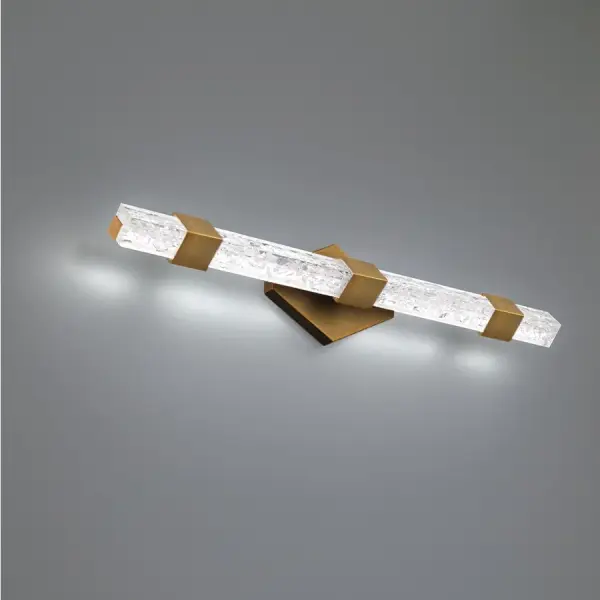 The Regal vanity light combines mid-century modern elegance with Hollywood glamour through reclaimed crystal shards that sparkle with LED illumination. Its 28-inch length and versatile mounting make it perfect for larger bathrooms.