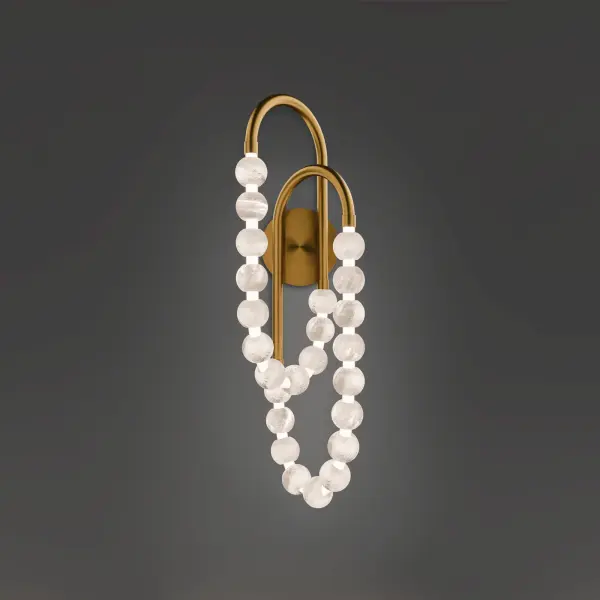 The Parel Wall Sconce transforms walls into galleries with its ethereal Spanish Alabaster spheres suspended in delicate Silica Strands. This 27" statement piece delivers warm 3000K LED light through a cascade of pearl-like luminosity. - alternate view